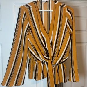 A classy, flowy, light material blouse.